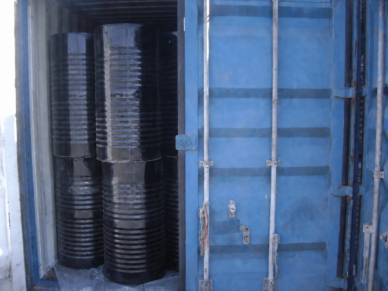 Drums loaded in a container, from historical trading records